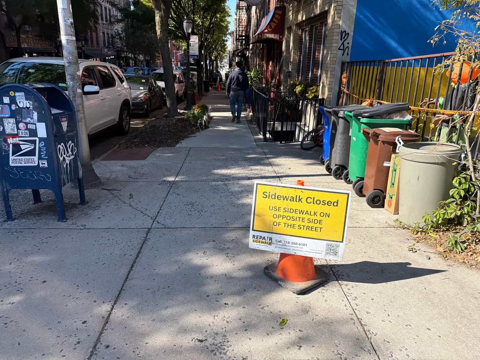 NYC sidewalk repair work zone for violation removal
