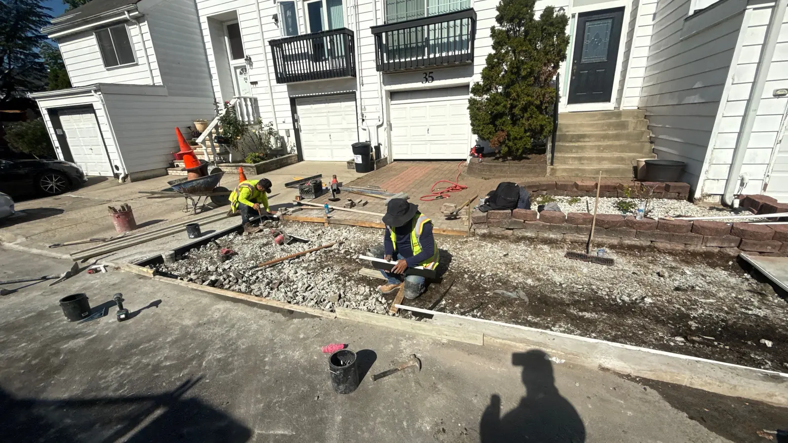 Sidewalk base preparation before tree-damage concrete repair